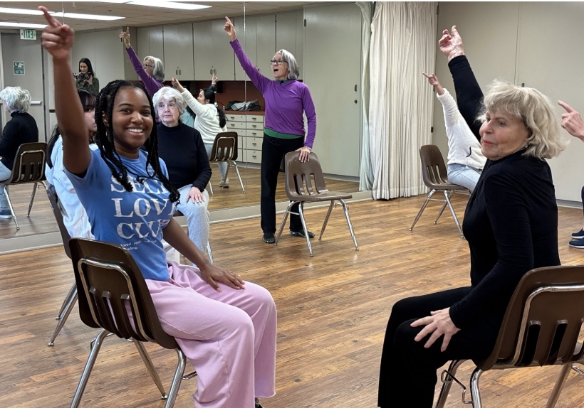 students dancing with older adults who have parkinsons disease